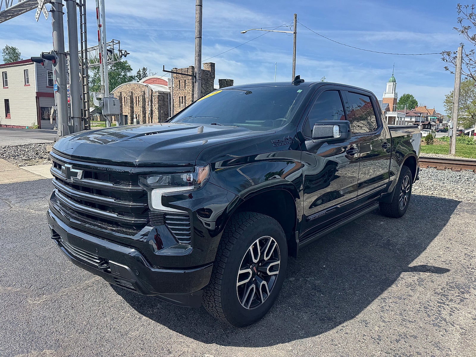 2024 Chevrolet Silverado 1500 High Country in Black — front three-quarter view