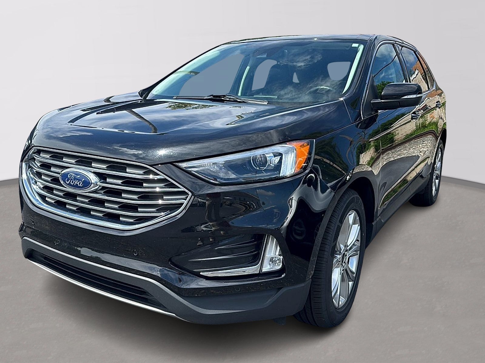 2024 Ford Edge Titanium in Black — front three-quarter view